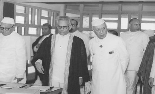 Pt. Jawaharlal Nehru with Dr. A. C. Joshi inside Panjab University Library after the formal inauguration of the Library (23 October 1963)